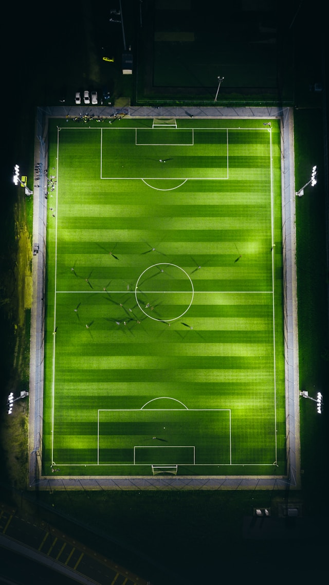 A floodlit pitch seen from directly above, nothing hidden from view