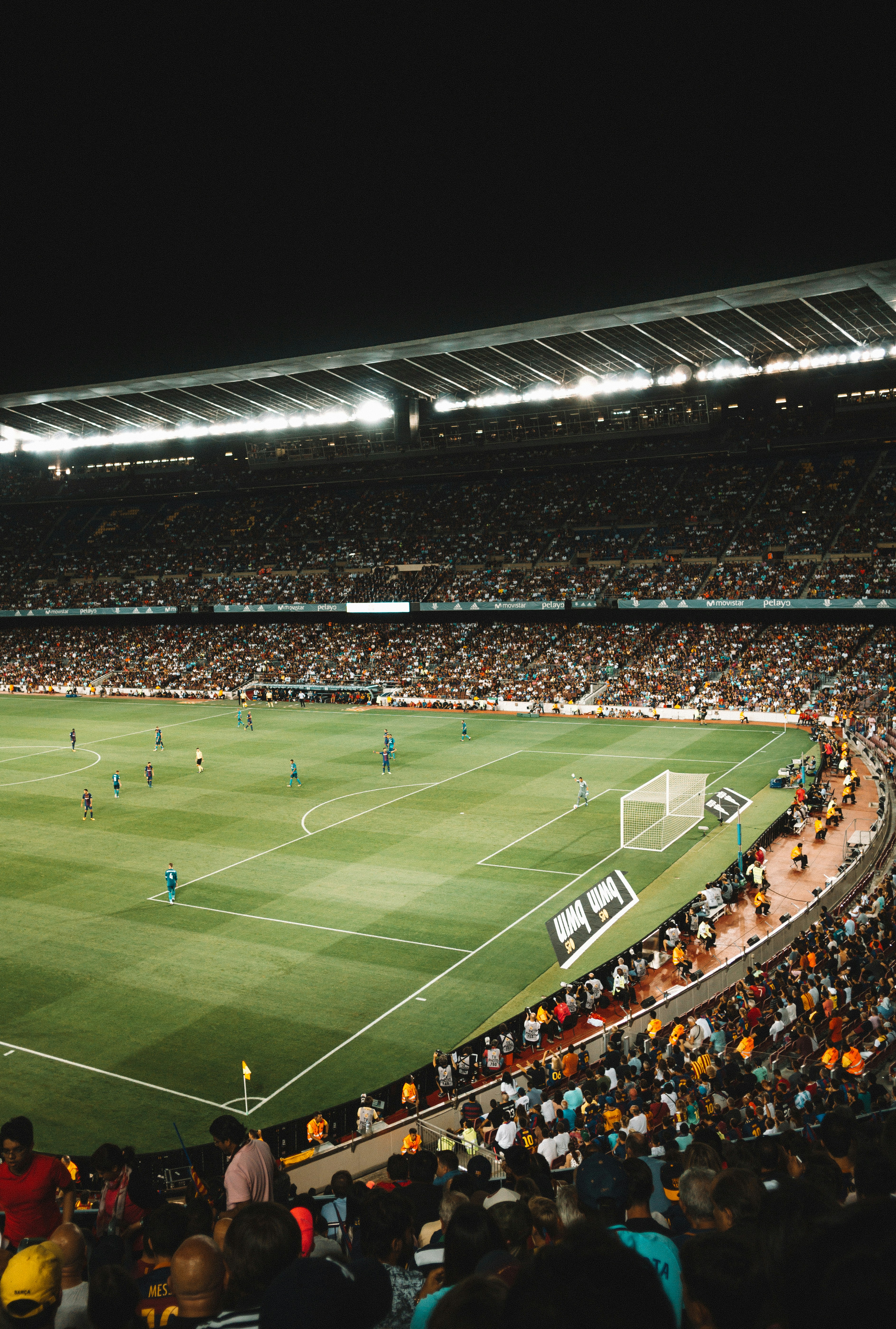 Supporters filling the stands of a football stadium